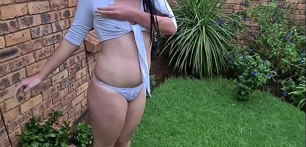  Chubby slut pissing in garden with thunderstorm with wet shirt